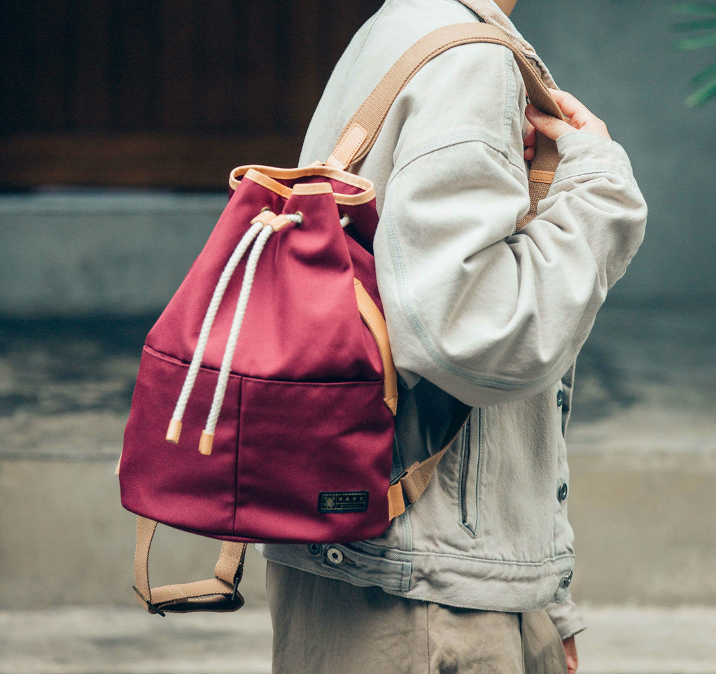 Voyage Backpack with Draw-String and Leather Trim - WEMUG