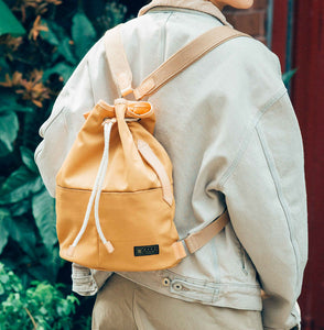 Voyage Backpack with Draw-String and Leather Trim - WEMUG