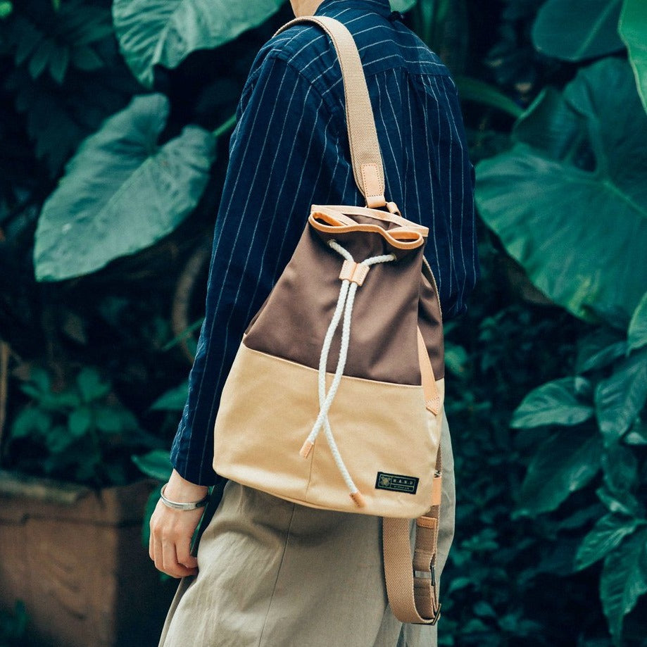 Voyage Backpack with Draw-String and Leather Trim - WEMUG